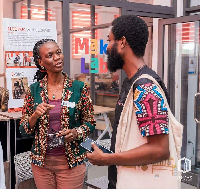 Attendees network during a Pollinate Impact workshop held in Accra, Ghana in September 2023.