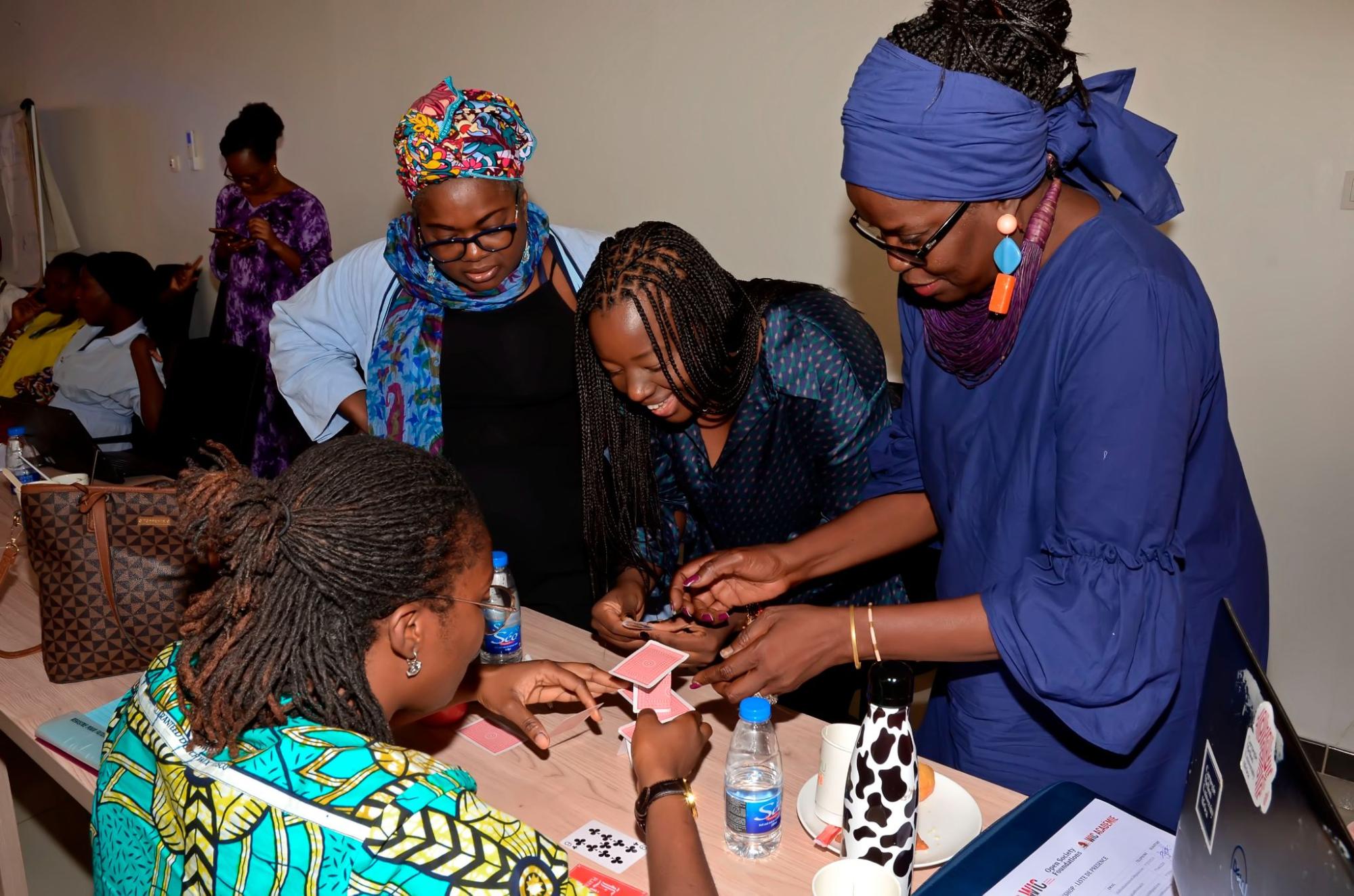 Women entrepreneurs doing a team building exercise during a workshop on Leadership