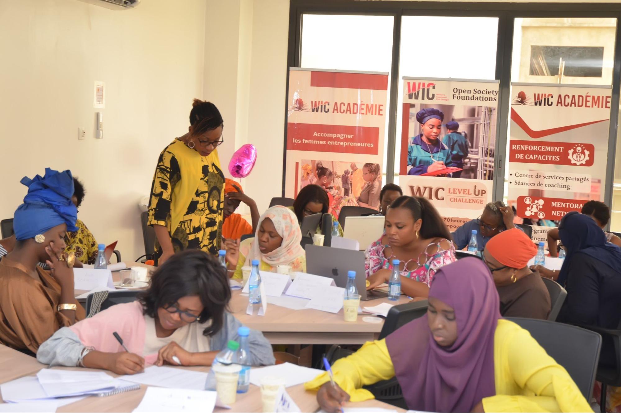 Women entrepreneurs working on their Business Model Canvas